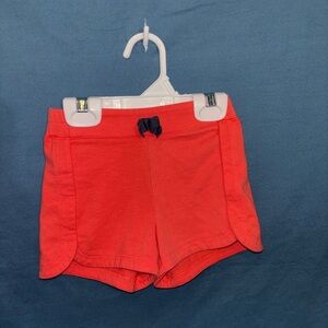Girls' Athletic Red Shorts with Navy Bow Accent